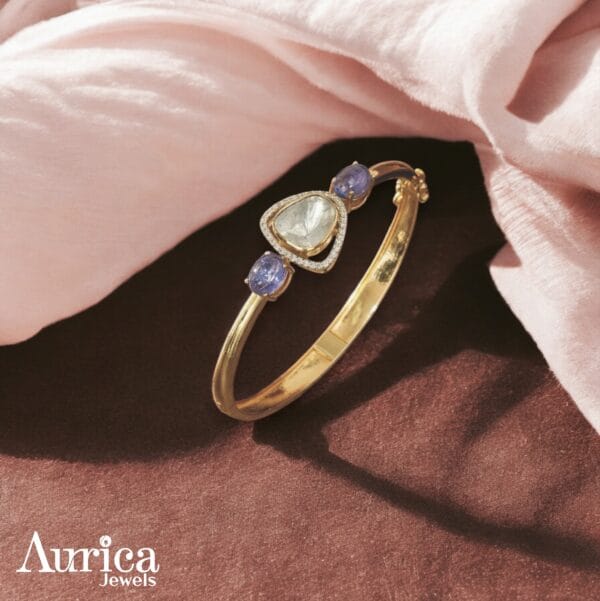 radiant colour bracelet, polki and cz diamonds, tanzanites, pear shaped polki and two tanzanites either side