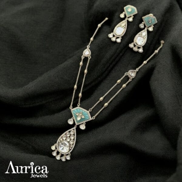 polki with carved turqoise stone necklace