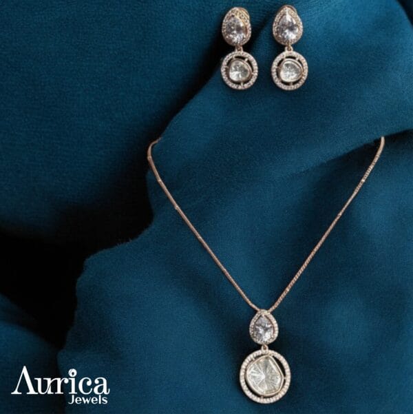 The Lustrous Harmony Polki Pendant Set exudes refinement, blending contemporary sophistication with traditional allure.