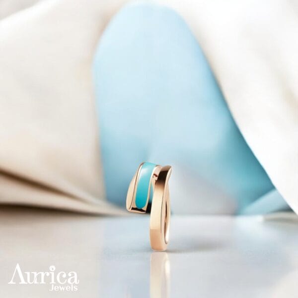 The Oceanic Embrace Metallic Ring is a stunning piece that harmonizes modern elegance with a refreshing burst of color.